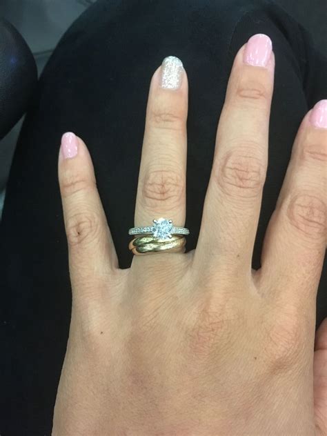 cartier trinity ring on hand
